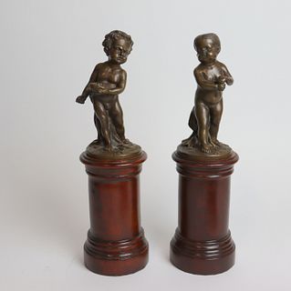 Unsigned Matched Pair Of Bronze Putti On Stands.