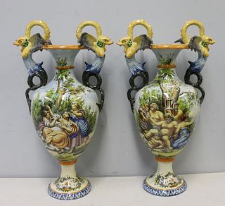 A Pair Of Majolica Style Decorated Urns With