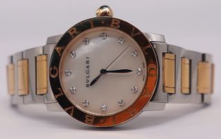 JEWELRY. Bvlgari 18kt Gold and Stainless Watch.