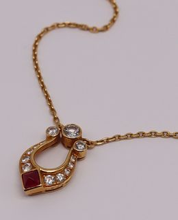 JEWELRY. Cartier 18kt Diamond and Ruby Pendant.