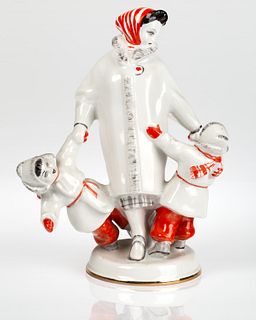 A SOVIET PORCELAIN FIGURAL GROUP OF A MOTHER WITH TWO CHILDREN, DULYOVO PORCELAIN FACTORY, DULYOVO, 1964-1968