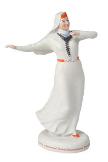 A SOVIET COMMERMORATIVE PORCELAIN FIGURINE OF A DANCING TATAR WOMAN FOR THE 1939 VDNKH EXHIBITION, DULEVSKY PORCELAIN FACTORY, 1940-1946