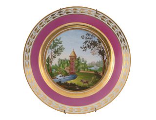 A RUSSIAN PORCELAIN PLATE WITH VIEW OF PAVLOVSK, POSSIBLY IMPERIAL PORCELAIN FACTORY, ST. PETERSBURG, 19TH CENTURY
