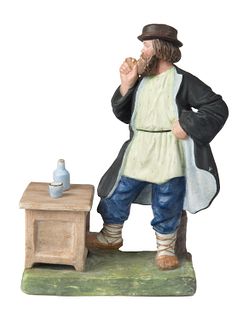 A RUSSIAN PORCELAIN FIGURE OF A PEASANT WITH A PIPE, GARDNER PORCELAIN FACTORY, MOSCOW, 1870-1890S