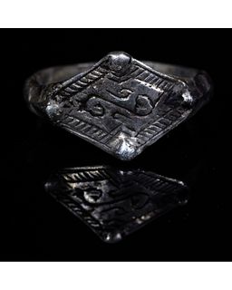 VIKING PERIOD SILVER RING WITH RUNIC SYMBOLS