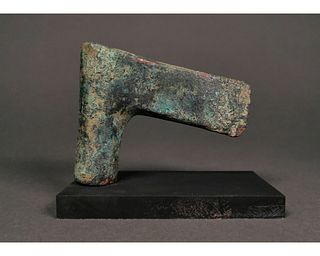BRONZE AGE AXE ON STAND
