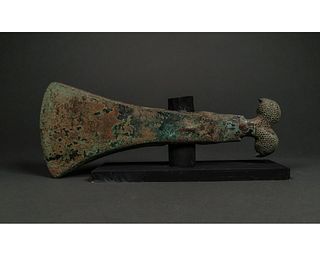 WESTERN ASIATIC BRONZE AXE WITH EAGLE HEADS