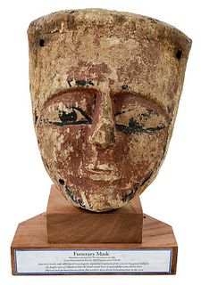 An Egyptian Polychromed Wood Funerary Mask