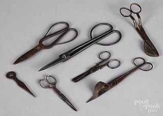 Seven wrought iron scissors and snuffers, 19th c.