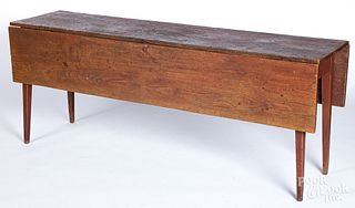 Stained pine harvest table, 19th c.