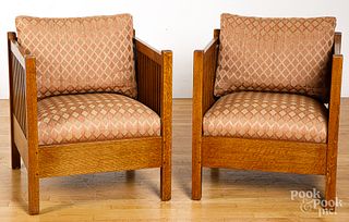 Pair of Stickley oak armchairs.