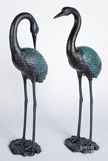 Pair of painted iron egret lawn ornaments.
