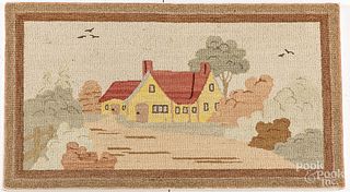Large Canadian hooked rug of a house.