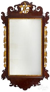 Chippendale mahogany and giltwood looking glass.