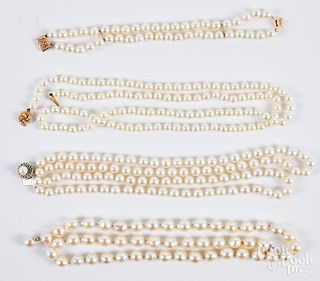 Three pearl necklaces and a bracelet