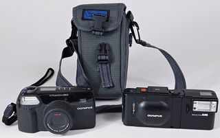 Two Olympus 35mm Cameras.