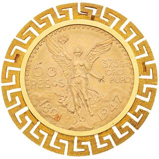 PENDANT / BROOCH WITH DEMONETIZED COIN. 21.6K AND 14K YELLOW GOLD