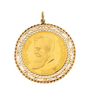 PENDANT WITH DEMONETIZED COIN. 21.6K AND 16K GOLD