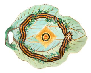 A RUSSIAN PORCELAIN LEAF-SHAPED DISH FROM THE SERVICE OF THE ORDER OF ST. GEORGE, IMPERIAL PORCELAIN FACTORY, ST. PETERSBURG, PERIOD OF ALEXANDER III 