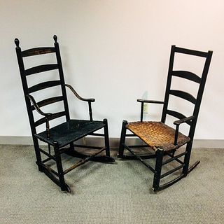Two Black-painted Slat-back Armed Rocking Chairs.