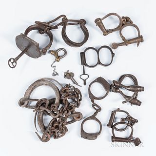 Group of Iron Shackles and Handcuffs