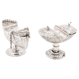 PAIR OF INCENSE BOATS (NAVETES) MEXICO, 18th-19th Century. Silver. Both decorated with vegetable and floral motifs, rinceaux.