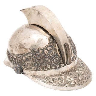 HELMET OF SANTIAGO MATAMOROS* MEX, 19th Century. Laminated and embossed silver. *Exhibited nationally and internationally.