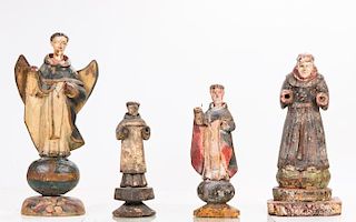 A Group of Four Carved Hardwood Santos Figures with Polychrome Decoration, 19th/20th Century.