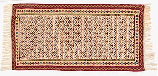 A Persian Wool Rug, 20th Century.