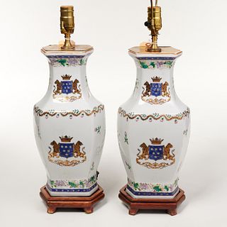 Pair Armorial style porcelain vase lamps