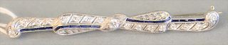 Platinum bar pin set with 17 diamonds and french cut sapphires, length 2 9/16.