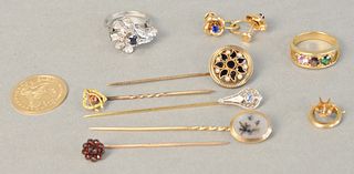 Gold lot to include 14k gold medal 3.4 gr, five stick pins, two gold rings, pair earrings, buckle fob, Total weight 26.4gr.