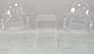 Three piece lot to include ghost style chairs along with lucite side table.