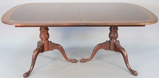 Drexel mahogany double pedestal dining table, with large banded inlaid top, ht. 30 1/2 in., top 48" x 74 ", with two leaves 22 in., opens to 48" x 118