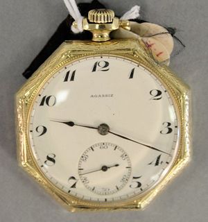 14k gold Agassiz pocket watch, open face with 8 sides, 42.8mm across, total weight 1.6 t.oz.