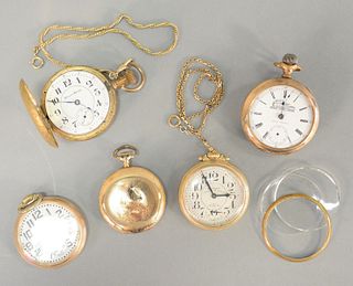 Five gold plated pocket watches, includes: a Seth Thomas with train on dial; with eagle on case; Hampden with train on back, etc.