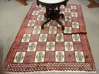 Oriental throw rug 4' x 7'.
