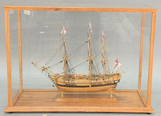 Three masted sailing ship model in glass case, H.M.S. Bounty, case 25" x 34".
