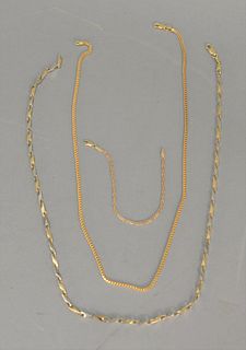 Three piece lot, to include 14K gold necklaces, one with alternating white and yellow gold along with a small 14K bracelet. 60.8 total grams.
