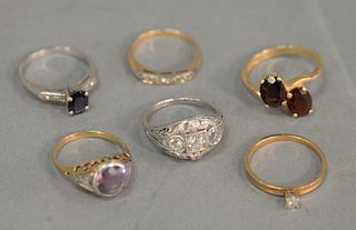 Six rings with stones, one platinum with diamonds, one platinum with blue stone. 3 being 14K gold, 15.8 total grams.