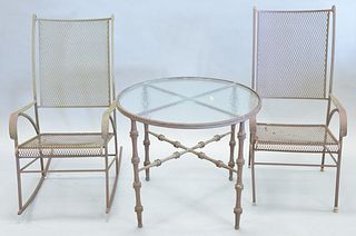 Three piece lot to include: two wire mesh chairs and a glass-top table, rocker, ht. 39", table, ht. 26", dia. 31". [Provenance: The Estate of Ed Brenn