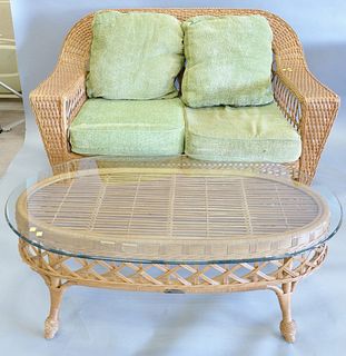 Smithsonian Henry Fink Wicker Patio set includes: loveseat with green cushions, 36 1/2" h. x 55" w. x 29" d. (seat); glass top coffee table, 16 1/2" h