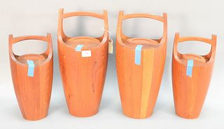 Group of four Dansk coolers, teak wine or ice buckets with handles, ht. 15 1/2" to 19 1/2".