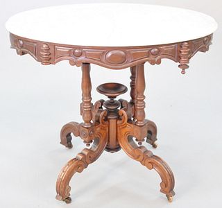 Oval Victorian marble top table, ht. 29", top 25" x 35".