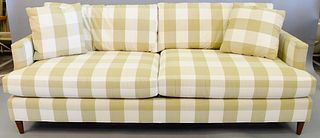 Taylor King upholstered sofa, green gingham pattern with pair of matching throw pillows, light wear, 88" l. Provenance: The Estate of Andrew Wolf, New