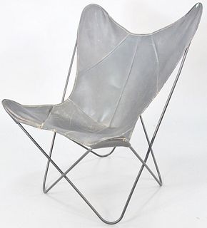 Hardoy/Knoll style butterfly chair, black leather, tubular metal frame, unmarked, wear to leather including loss and tear, 35" h., 30 1/2" w., 15 1/2"