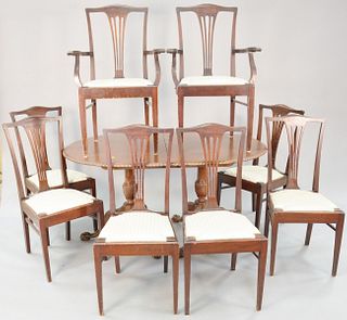 Custom mahogany oval double pedestal table on ball and claw feet, along with set of eight mahogany Federal style dining chairs. 29 1.2" h., top 39" x 