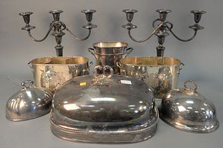 Silver plated group to include pair of double wire bottle holders, pair candelabras, three entree serving covers and a single wine cooler, tallest: 16