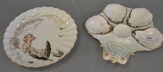 Nine French hand painted plates, including: six oyster plates, includes set of five Haviland sold by Brodhead & Hamlin and a Haviland Limoge, 8 1/4" d