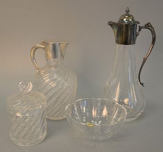 Four crystal pieces to include Baccarat jar and bowl and two pitchers with silver tops, tallest: 12" h. [Provenance: Estate of William and Teresa Patt